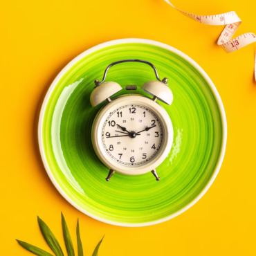 composition-with-plate-alarm-clock-measuring-tape-colored-background-diet-concept-weight-loss-plan-copy-space_127032-2213