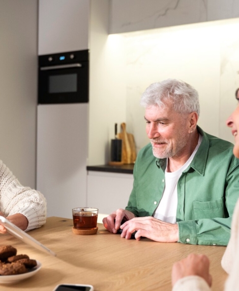 close-up-senior-people-sitting-together_23-2149241670