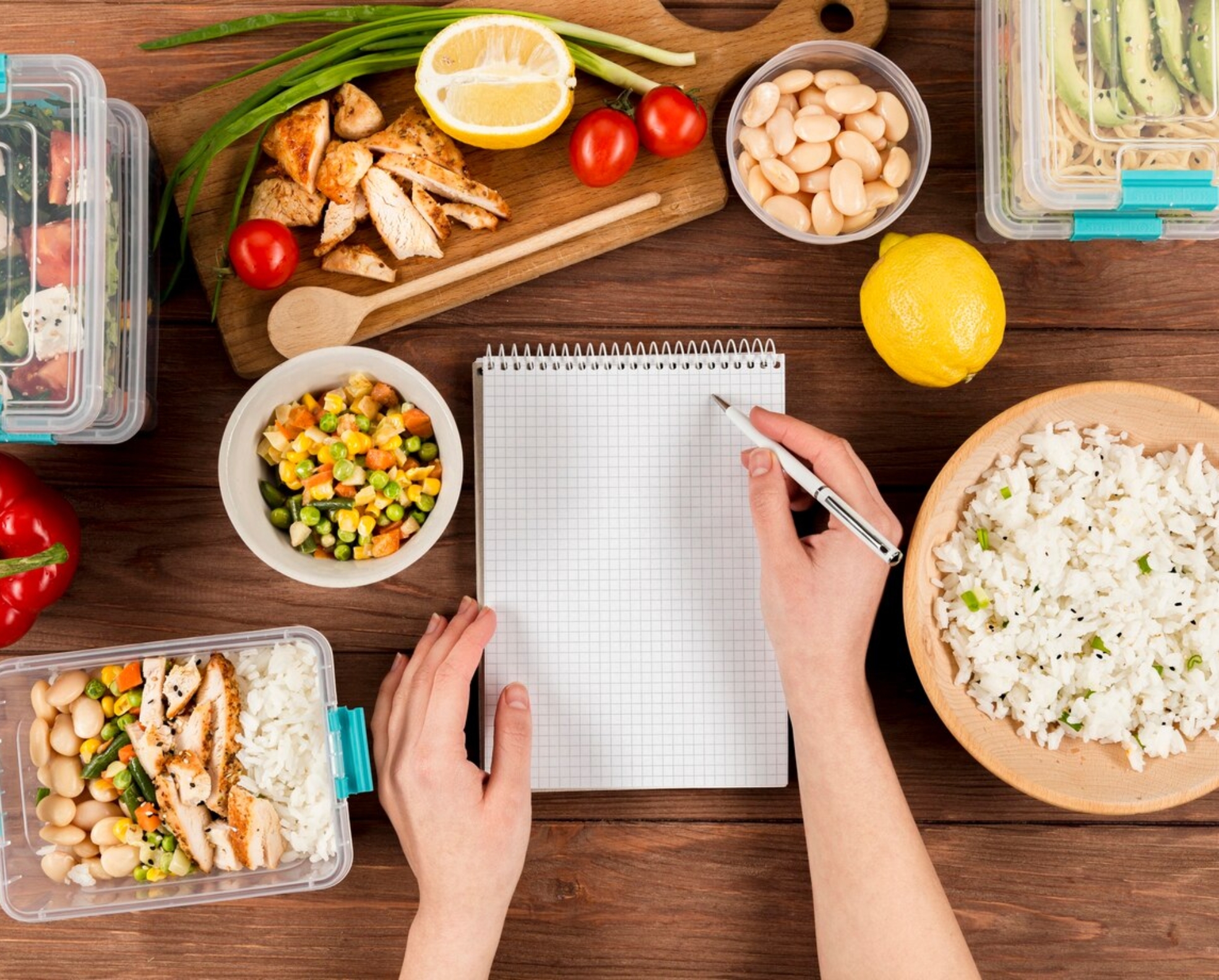 hands-writing-notebook-with-casseroles-ad-food_23-2148487771
