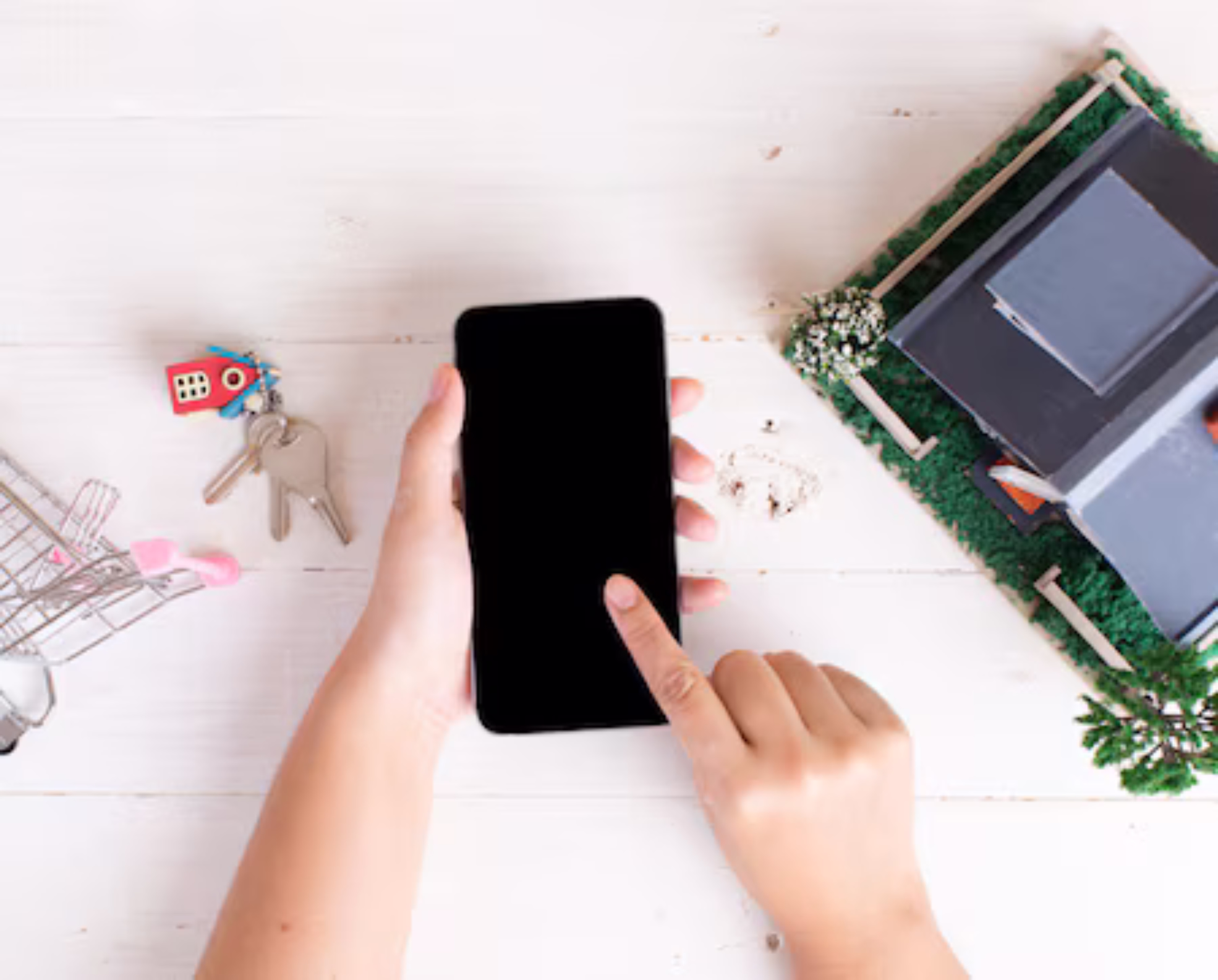 property-market-with-house-keys-shopping-cart-phone_1150-17832