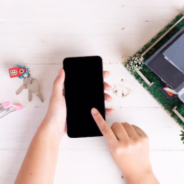property-market-with-house-keys-shopping-cart-phone_1150-17832