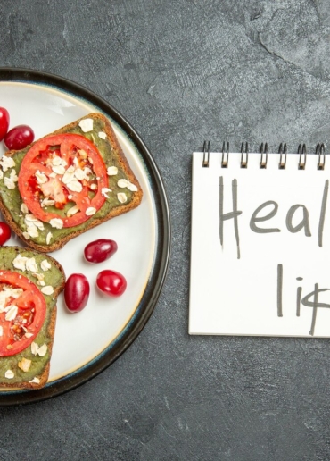top-view-delicious-sandwiches-with-sliced-tomatoes-healthy-life-writing-grey-surface-snack-bun-burger-sandwich-bread_140725-85905
